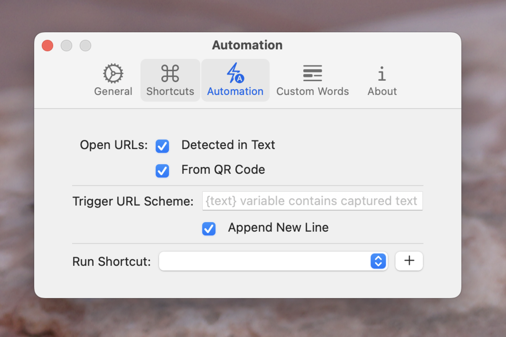 The automation tab of TRex's settings. The options include opening URLs form the text or a scanned QR code, the ability to trigger a URL scheme, and even the ability to trigger a shortcut. 