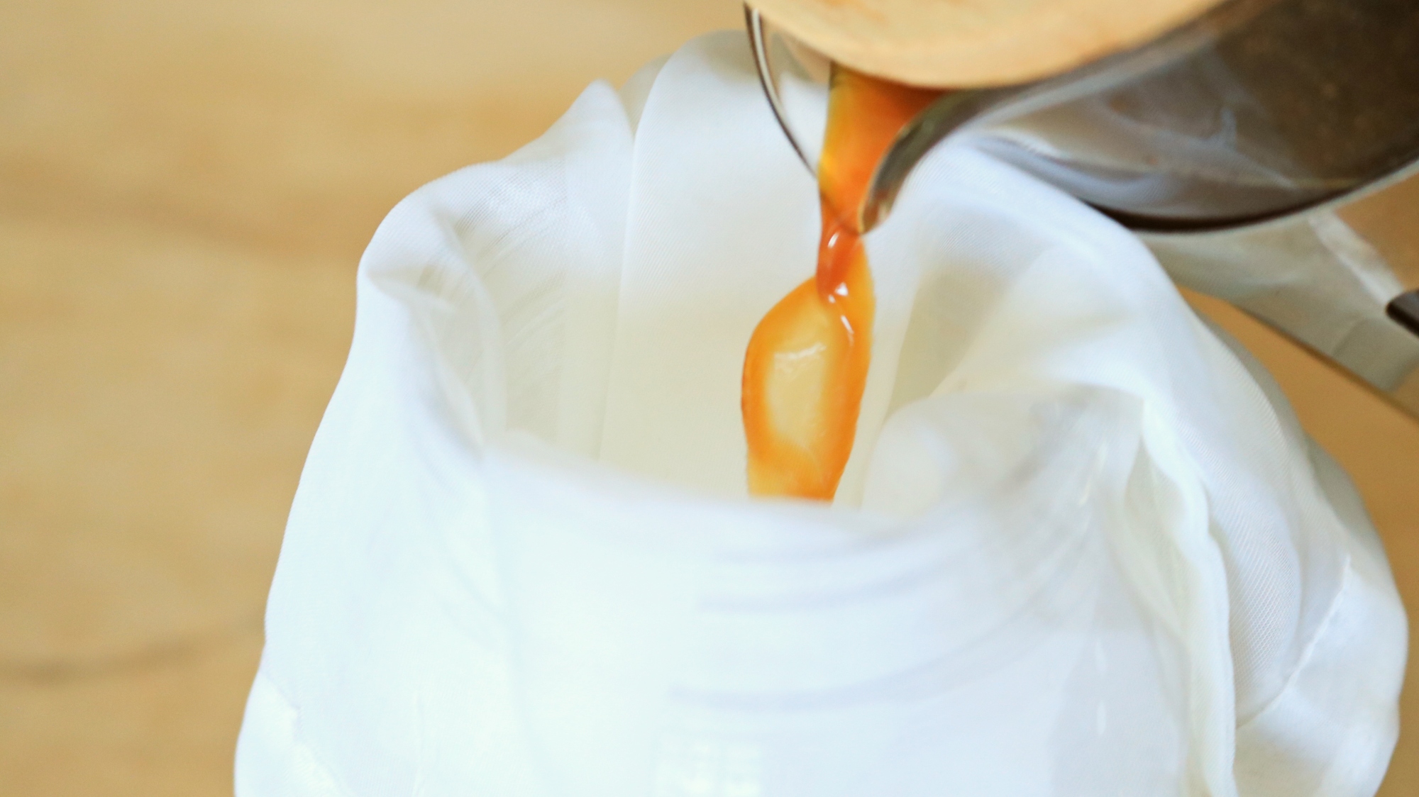 Coffee pouring into a strainer