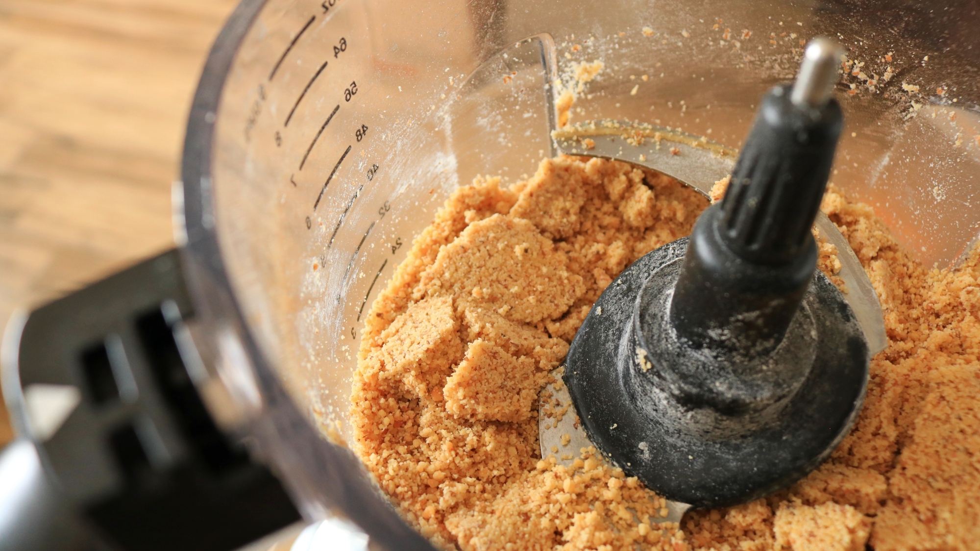 Ground toasted walnuts in a food processor.