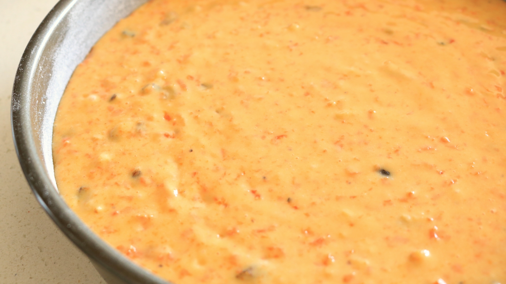 Carrot cake batter in a bowl